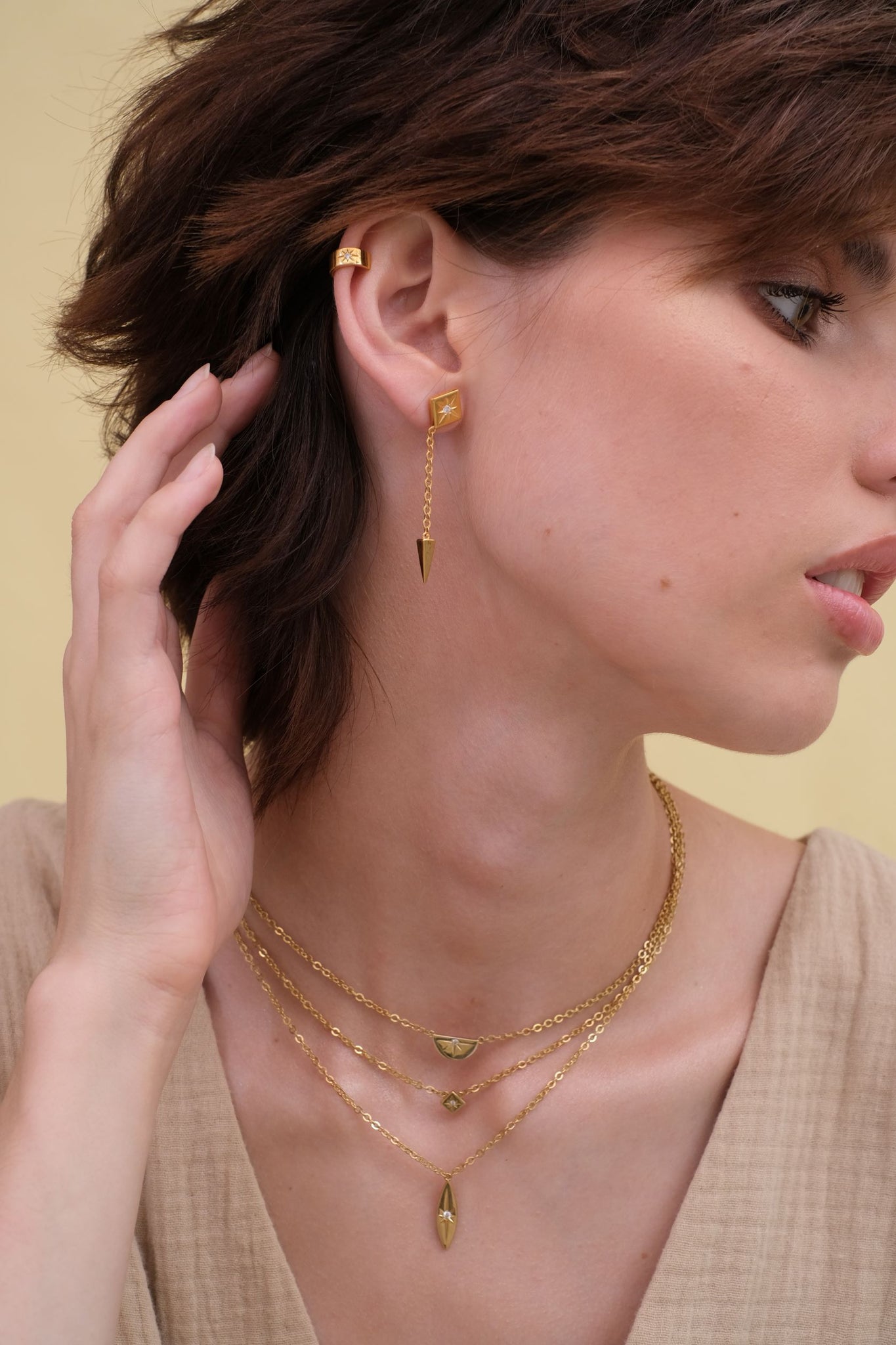 Asymmetrical studs with cuff